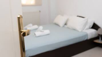 Fer et planche Ă repasser, draps fournis