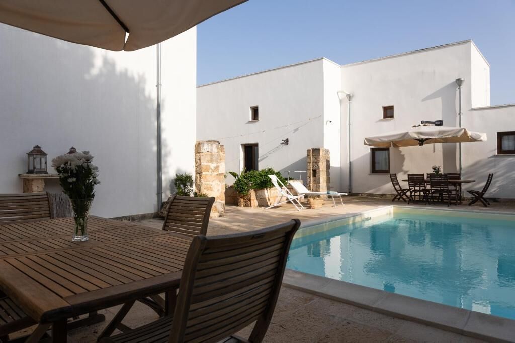 Seasonal outdoor pool, pool umbrellas, pool loungers