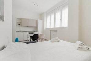 1 slaapkamer, een strijkplank/strijkijzer
