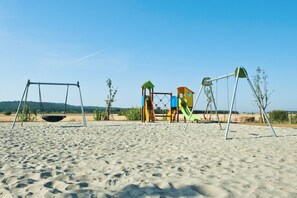 Children’s area - Casalappi two-bedroom 3-bedroom apartment in hamlet with pool (Campiglia Marittima)