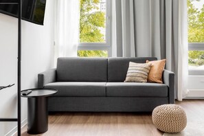 Estudio Deluxe | Área de sala de estar