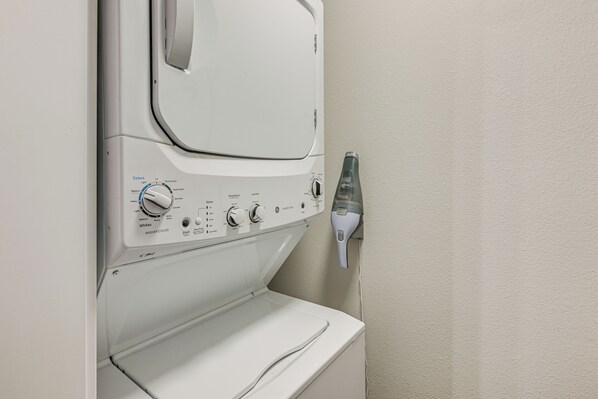 A front-loading washing machine with control panel, water inlet, and a wall-mounted dryer. - 5 Mi to Mt Rainier Nat'l Park: Gem w/ Lake Access (Ashford)