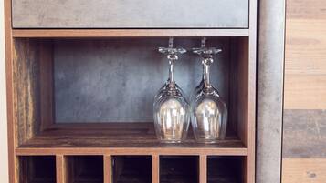 A wooden cabinet with a drawer and multiple shelves.