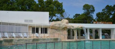 Seasonal outdoor pool, open 8:00 AM to 6:00 PM, pool umbrellas