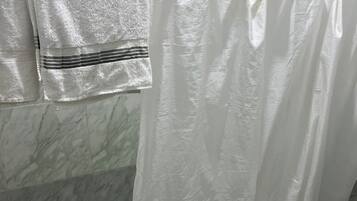 Hair dryer, towels, soap, toilet paper