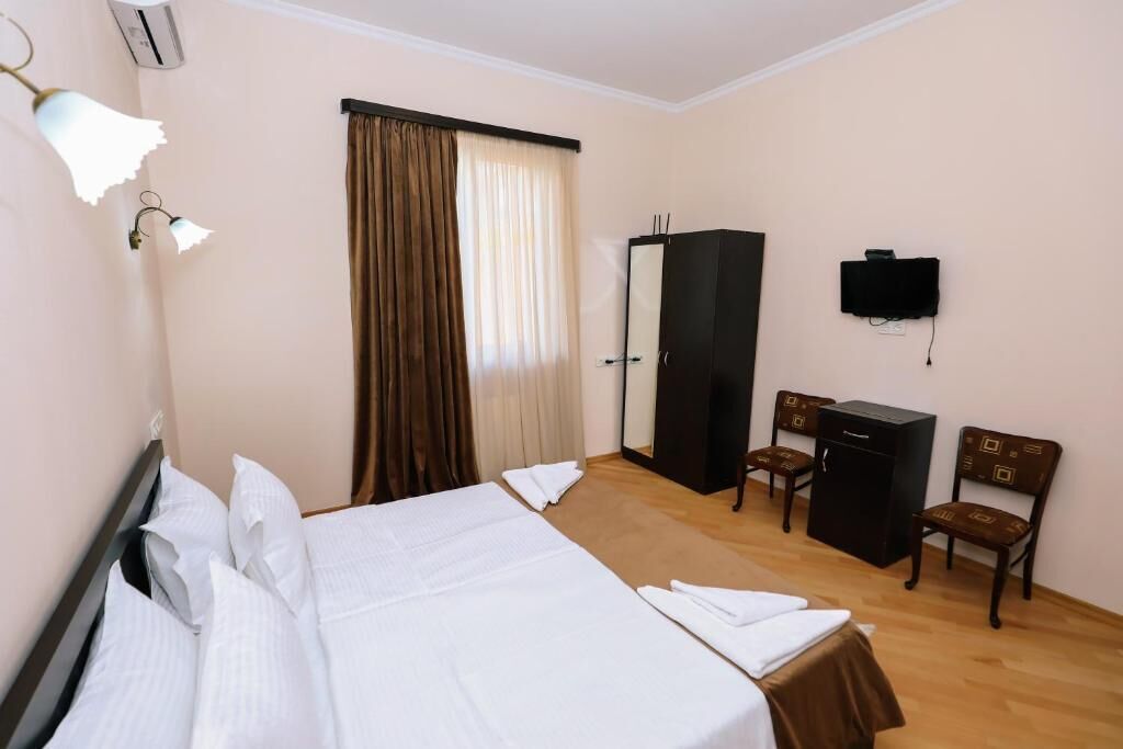 Family Room, City View | Iron/ironing board, free WiFi