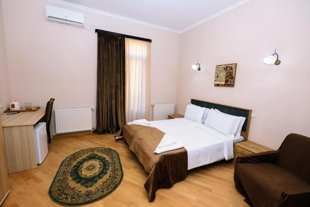 Deluxe Double Room, Balcony, City View | Iron/ironing board, free WiFi
