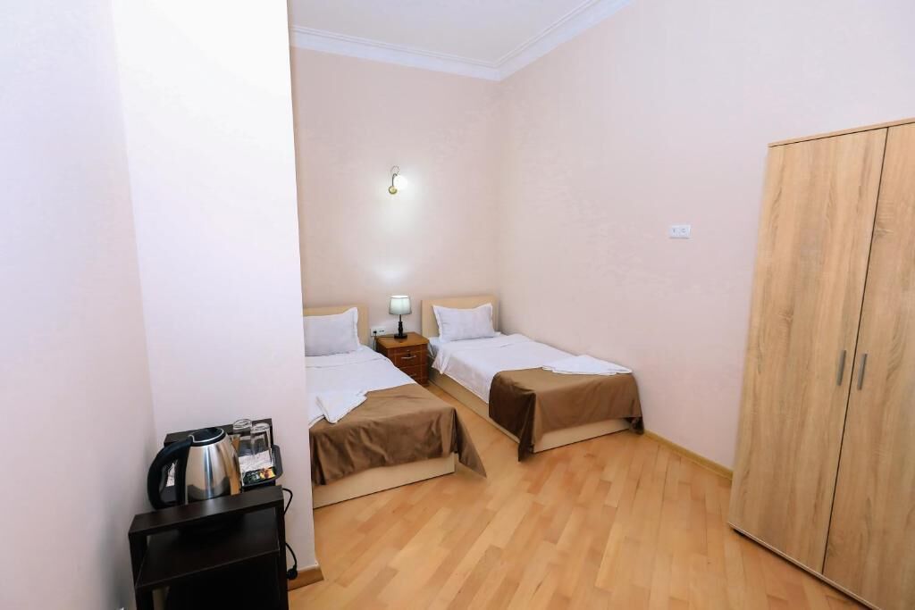 Standard Twin Room | Iron/ironing board, free WiFi