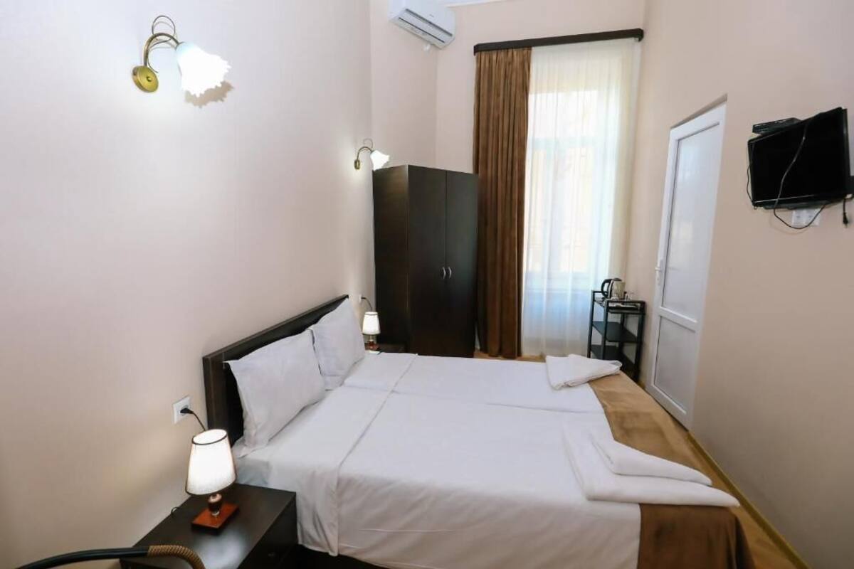 Standard Double Room, City View | Iron/ironing board, free WiFi