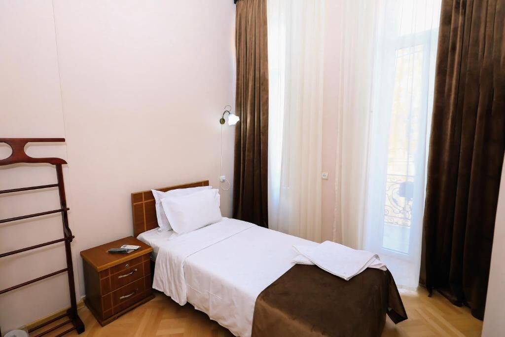 Basic Single Room, Balcony, City View | Iron/ironing board, free WiFi