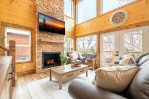 TV, fireplace - *Stylish 5BD Lodge w/ VIEWS! | Hot Tub + POOL* (Sevierville)