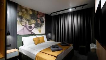 Habitación Deluxe doble, vistas a la ciudad | Cortinas opacas y sistema de insonorización