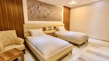 Coffres-forts dans les chambres, fer et planche à repasser