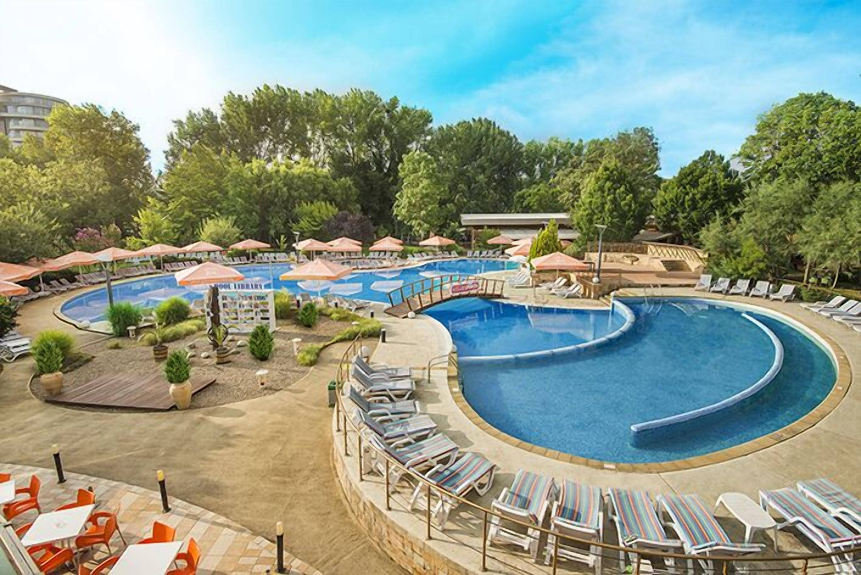 Indoor pool, open 8:00 AM to 6:00 PM, pool umbrellas, pool loungers