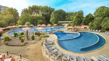 Indoor pool, open 8:00 AM to 6:00 PM, pool umbrellas, pool loungers