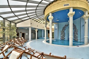 Indoor pool, open 8:00 AM to 6:00 PM, pool umbrellas, pool loungers