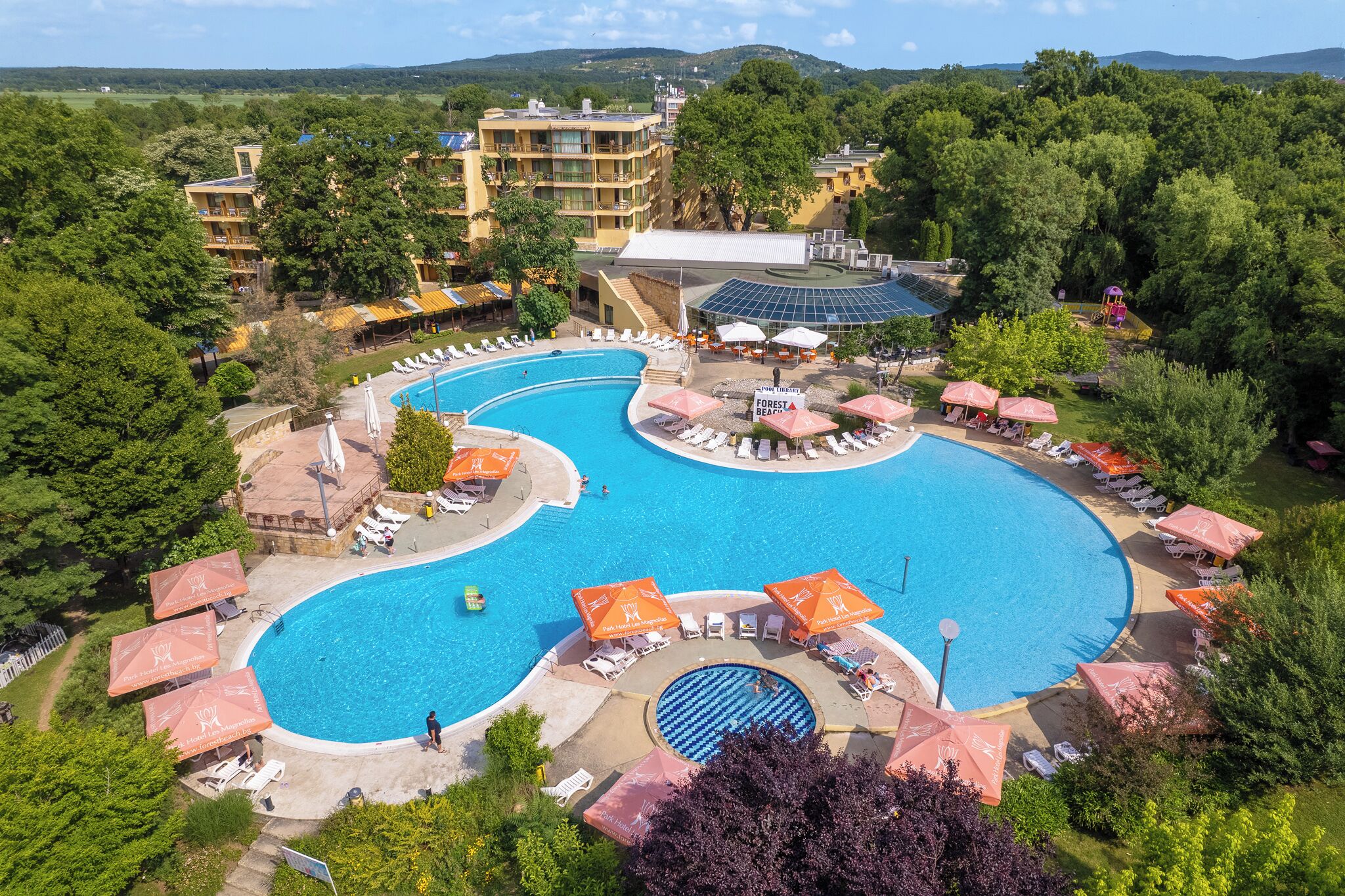 Indoor pool, open 8:00 AM to 6:00 PM, pool umbrellas, pool loungers