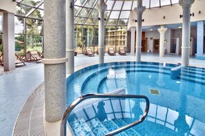 Indoor pool, open 8:00 AM to 6:00 PM, pool umbrellas, pool loungers