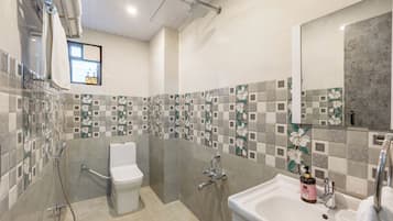 Premium Apartment, 2 Bedrooms (Apartment) | Bathroom | Shower, hair dryer, towels, soap