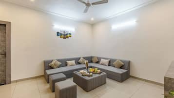 Premium Apartment, 2 Bedrooms (Apartment) | Living area | 55-cm LED TV with digital channels
