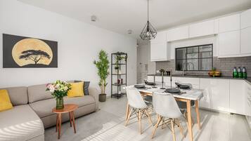 Comfort Apartment, Patio, Desert View | Living area | 40-inch LCD TV with digital channels