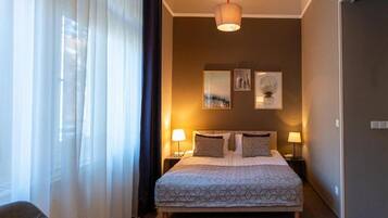 Familien-Vierbettzimmer | Zimmersafe, Verdunkelungsvorhänge, Bügeleisen/Bügelbrett