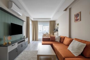 Comfort Apartment, 2 Bedrooms | Living area | 80-cm TV with cable channels - Gokmen Residences (Antalya)