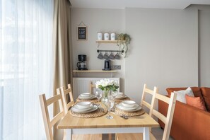 Comfort Apartment, 2 Bedrooms | Living area | 80-cm TV with cable channels - Gokmen Residences (Antalya)