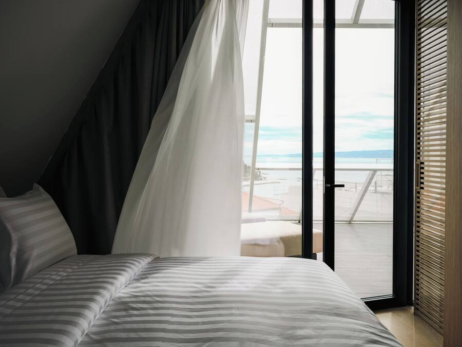 Signature suite (Venturo) | Een kluis op de kamer, een strijkplank/strijkijzer, gratis wifi