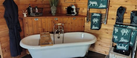 Shower, deep soaking tub, hair dryer, towels