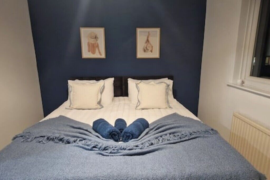 2 dormitorios, tabla de planchar con plancha, wifi y ropa de cama