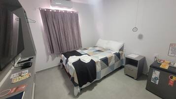 Quarto casal superluxo, ar-condicionado | Wi-Fi de cortesia