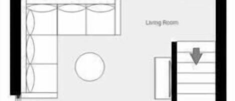 A floor plan of a hotel with a kitchen, dining area, living room, two bedrooms, a bathroom, and a laundry room.