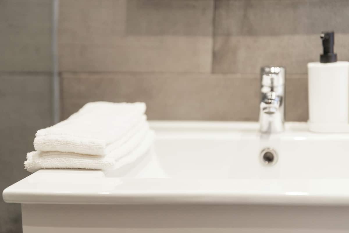 Deluxe huis | Badkamer | Gratis toiletartikelen, een haardroger, handdoeken, zeep