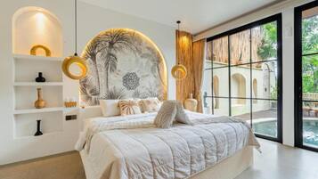 Deluxe Villa, Patio, Pool View | Minibar, bed sheets