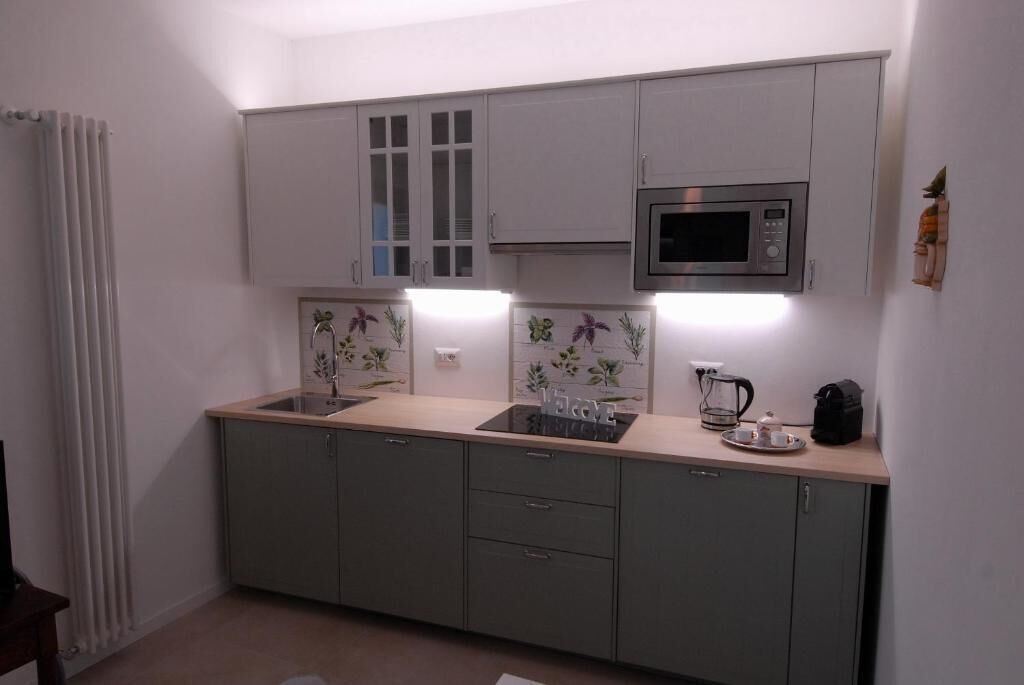 經典公寓, 庭園景觀 | 私人廚房 | 義式濃縮咖啡機、咖啡機/沖茶器、電熱水壺、餐桌