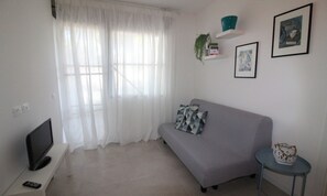 Lägenhet - 1 sovrum - terrass - utsikt mot trädgården | Vardagsrum