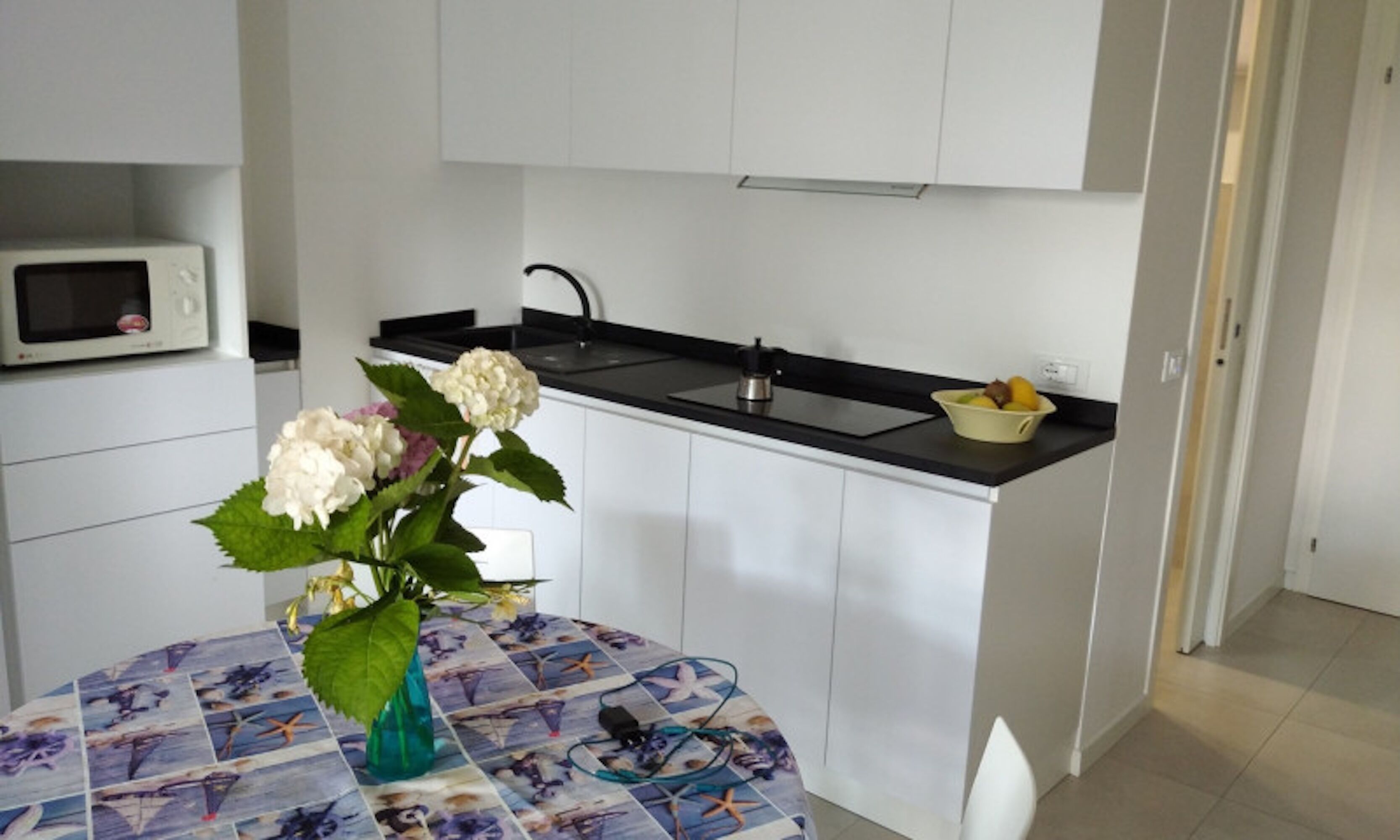 Lägenhet - 1 sovrum - terrass - utsikt mot trädgården | Interiör