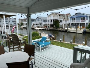 Outdoor dining - 3BR Waterfront Home | Private Dock, Views & Porch (Fenwick Island)