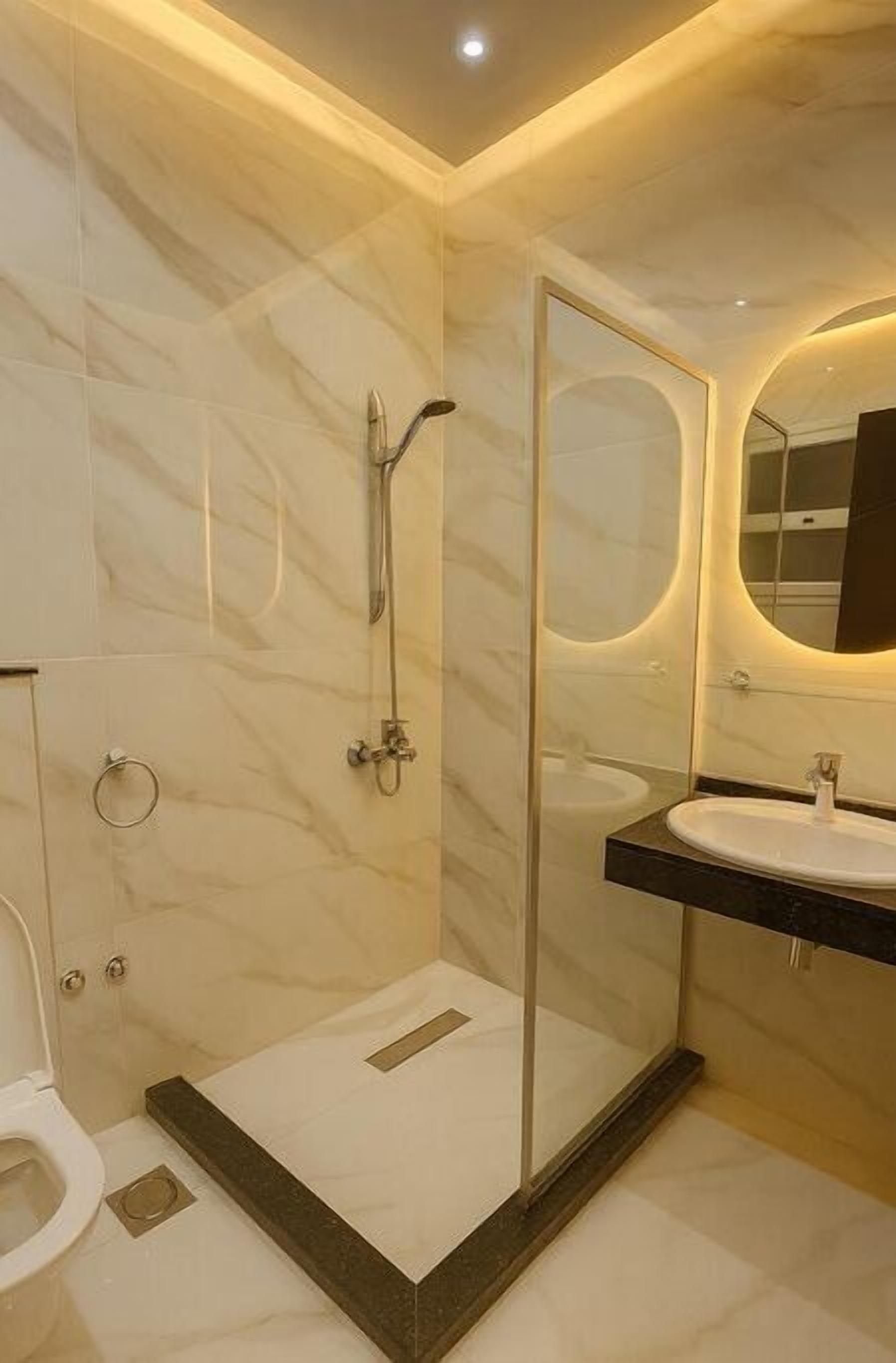 Shower, towels, soap, toilet paper