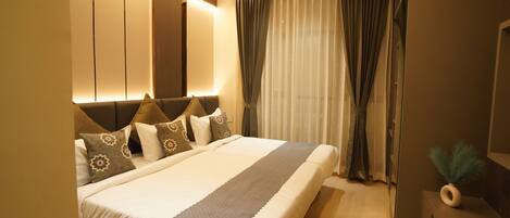 Executive Triple Room, City View | Desk, laptop workspace, free WiFi