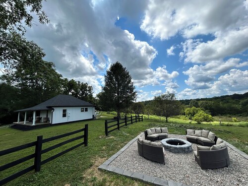 Newly renovated farmhouse on a peaceful and private 125 acres in Owen county