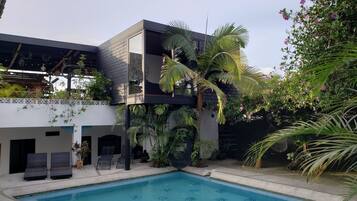 Outdoor pool, open 9:00 AM to 9:00 PM, pool loungers