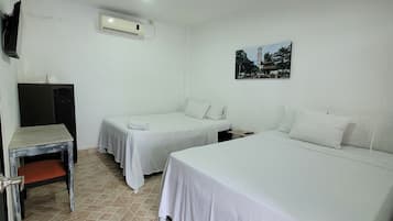 Quarto quádruplo standard | Wi-Fi de cortesia, roupa de cama