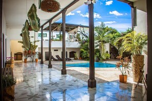 Outdoor pool, open 9:00 AM to 9:00 PM, pool loungers - Hotel Capilla del Sol (Garzon)
