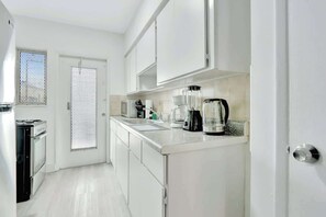 Fridge, microwave, oven, stovetop - 1BR Miami Beach Apt with King plus 2 Queens & Workspace (Miami Beach)