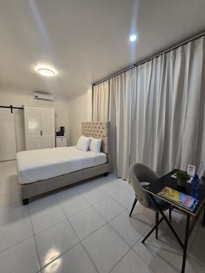 Deluxe Single Room, Balcony, Pool View | In-room safe, desk, laptop workspace, blackout drapes - Jagdesh Apartments  (Anna Regina)