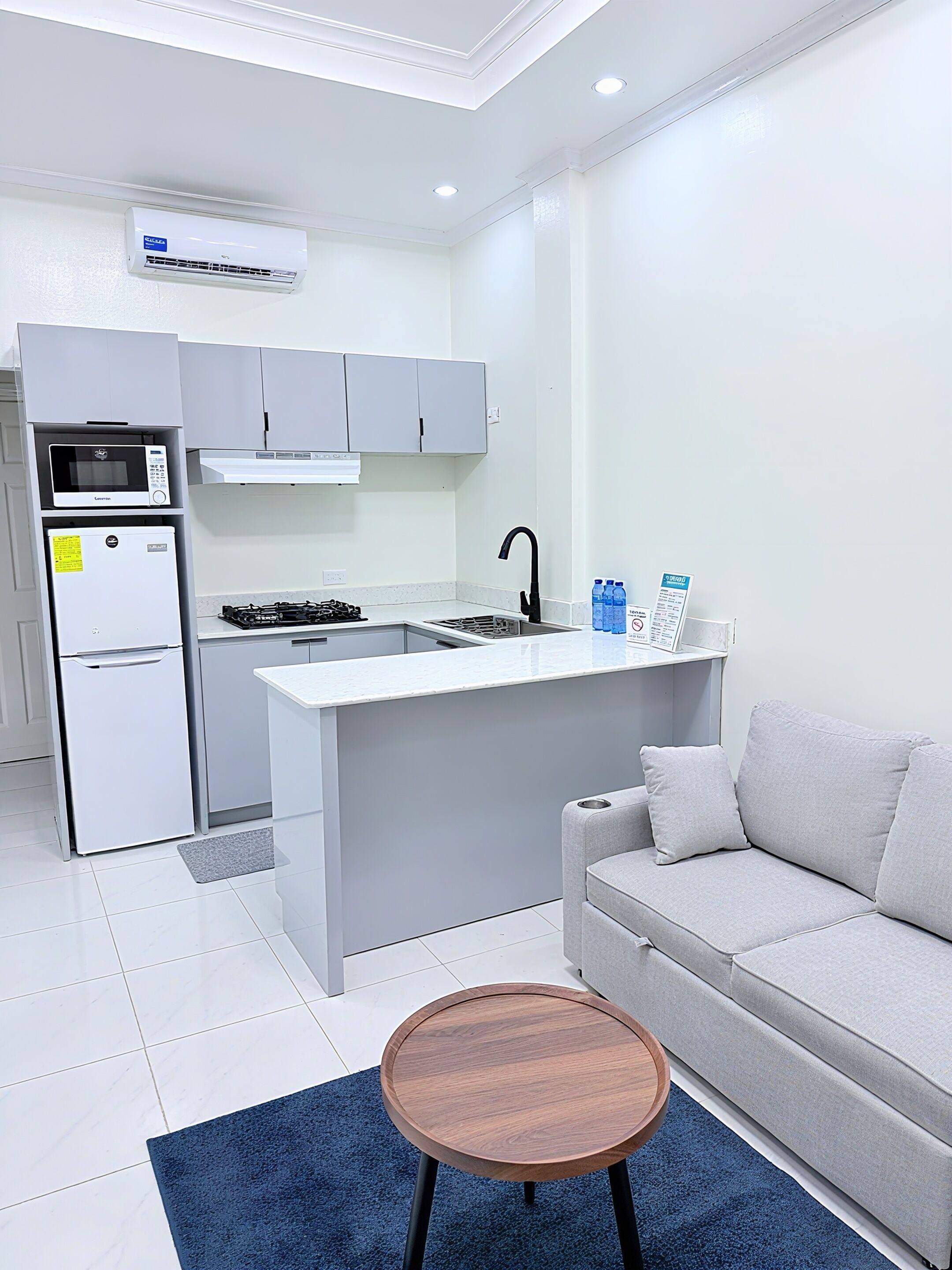 Suite Deluxe, 2 camere da letto, vista piscina | Area soggiorno