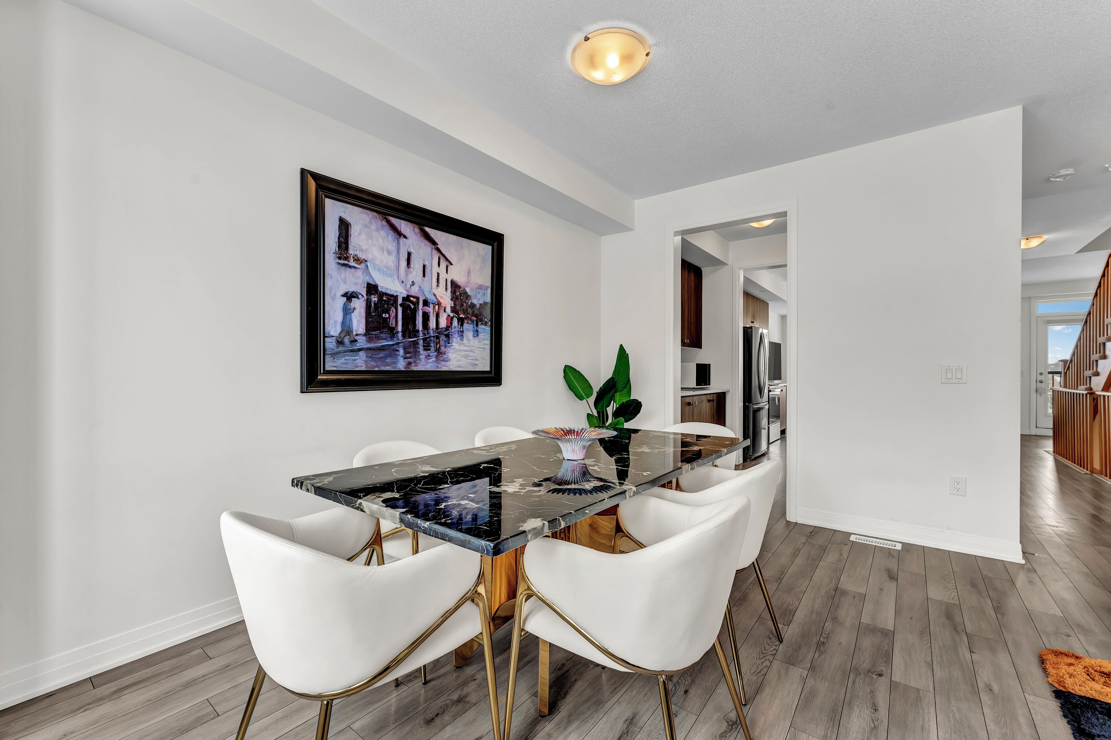 Another angle of the dining area and kitchen entryway