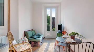 Doppelzimmer, Balkon, Gartenblick | Wohnbereich